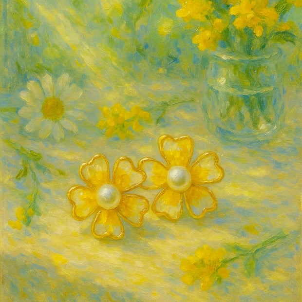 Someday she - Dream visual oil painting of Dandelion Wine yellow floral earrings with pearl centers, resting on a sun-drenched table next to a glass vase of mimosa flowers.
