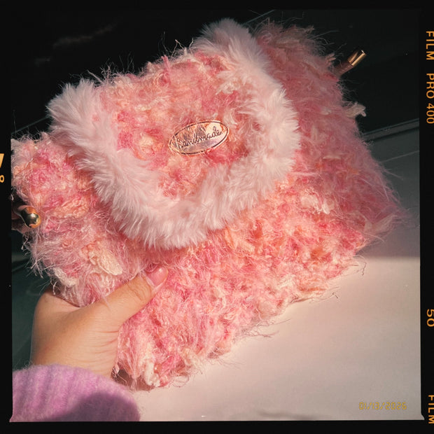 Someday she - Peaches Never Sleep one-of-a-kind hand-blended artisanal bag in a soft peach and pink colorway, featuring a shaggy textured finish and elegant pearl strap.
